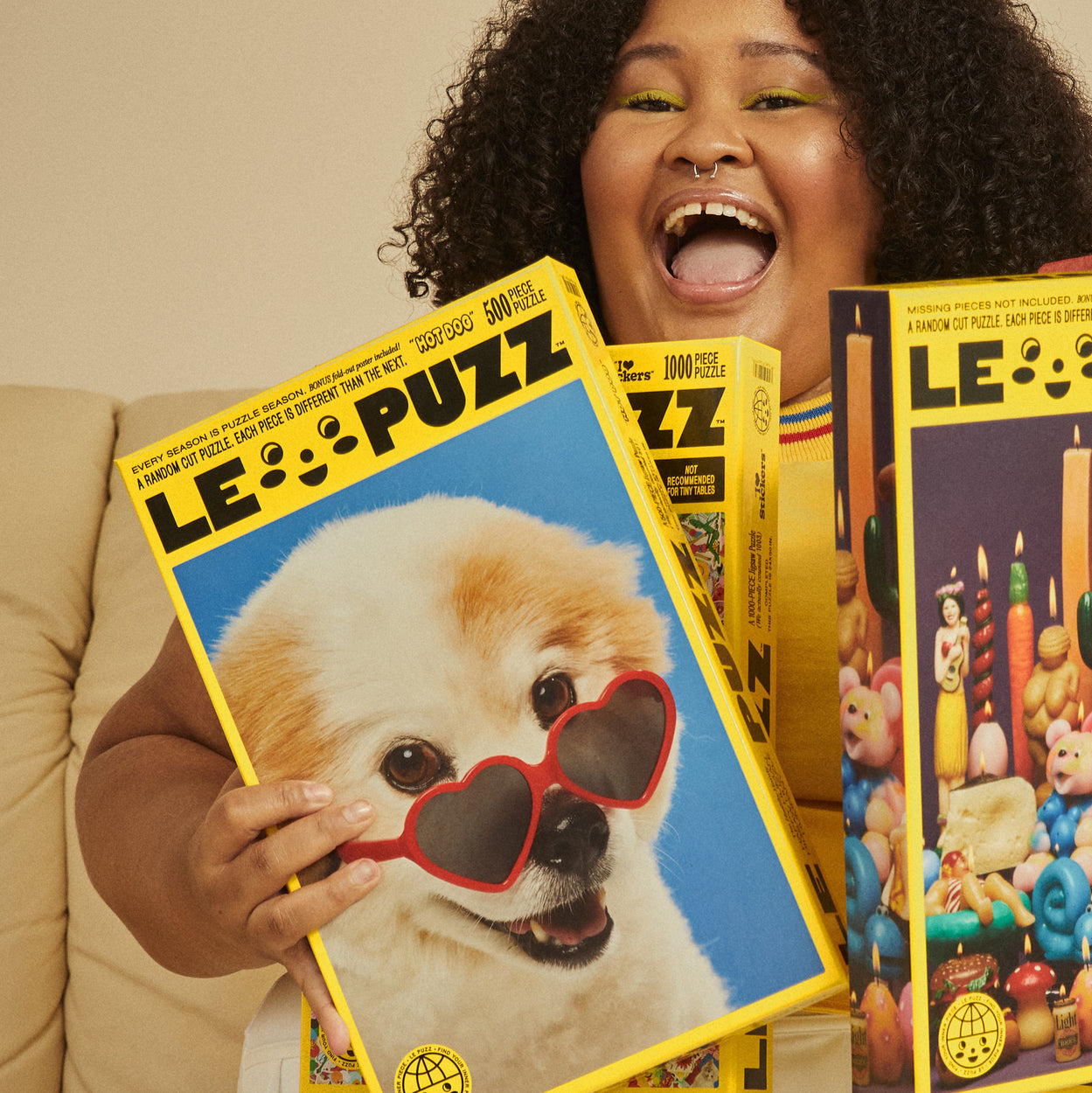 Hot Dog Puzzle | Le Puzz | 500 Pieces: Cream Fluffy Dog with Heart Sunglasses Puzzle. Hot Dog features our furry fwend Bucky! When we met Bucky we knew he’d make a perfect puzzle pal. He stole our hearts with his teeny grin and heart shaped sunglasses.